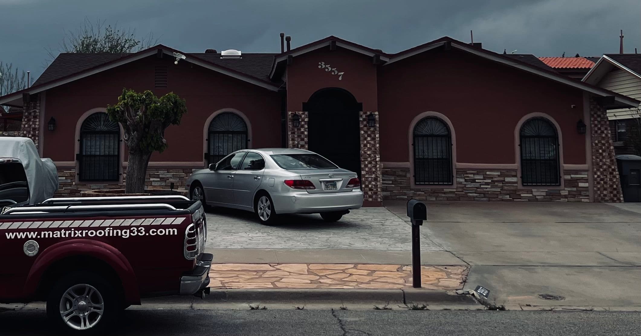 Roofing and Exterior Enhancement for Red Brick House